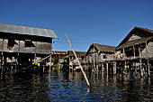 Inle Lake Myanmar. All the buildings are constructed on piles. Residents travel around by canoe, but there are also bamboo walkways and bridges over the canals, monasteries and stupas. 